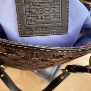 *SOLD* Coach Bag in EUC. #E0768-11237  This is a classic. Periwinkle interior